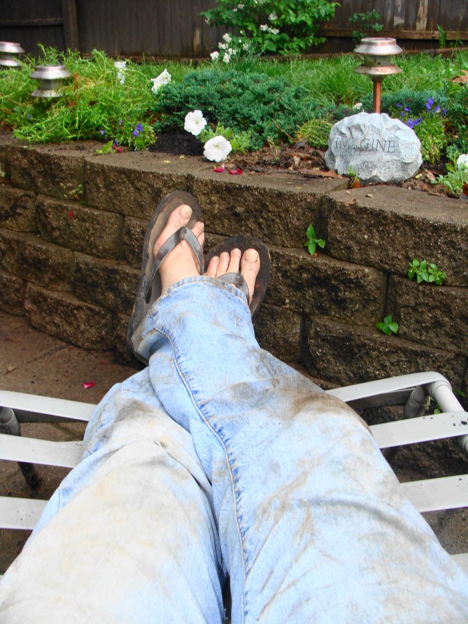 Connie surveys her handiwork after an exhausting day in the garden.